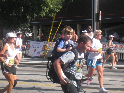 He was RUNNING - 6.2 miles carrying his son - what a guy!